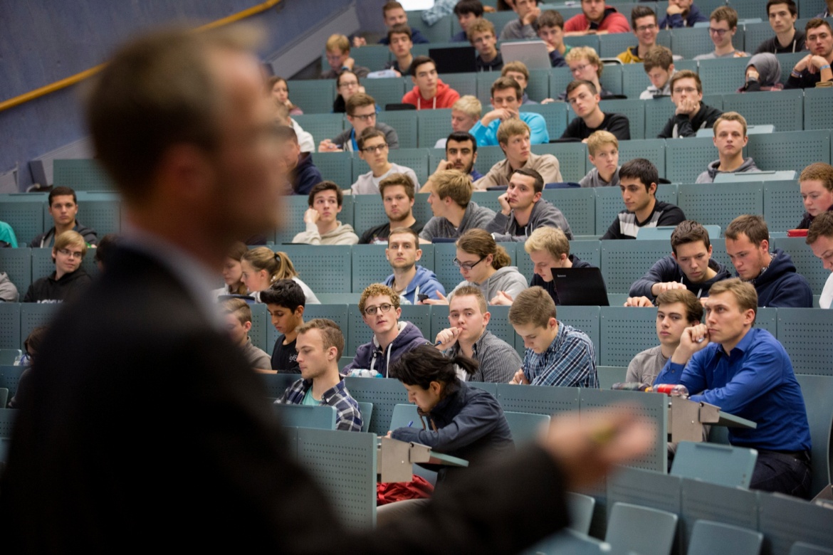 A lecturer in the lecture hall of students